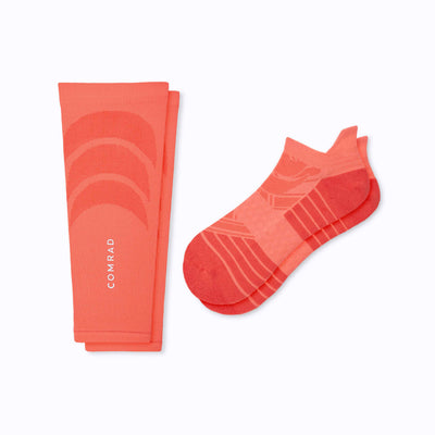 A 2 pack of tab athletic socks and calf sleeve compression coral solid
