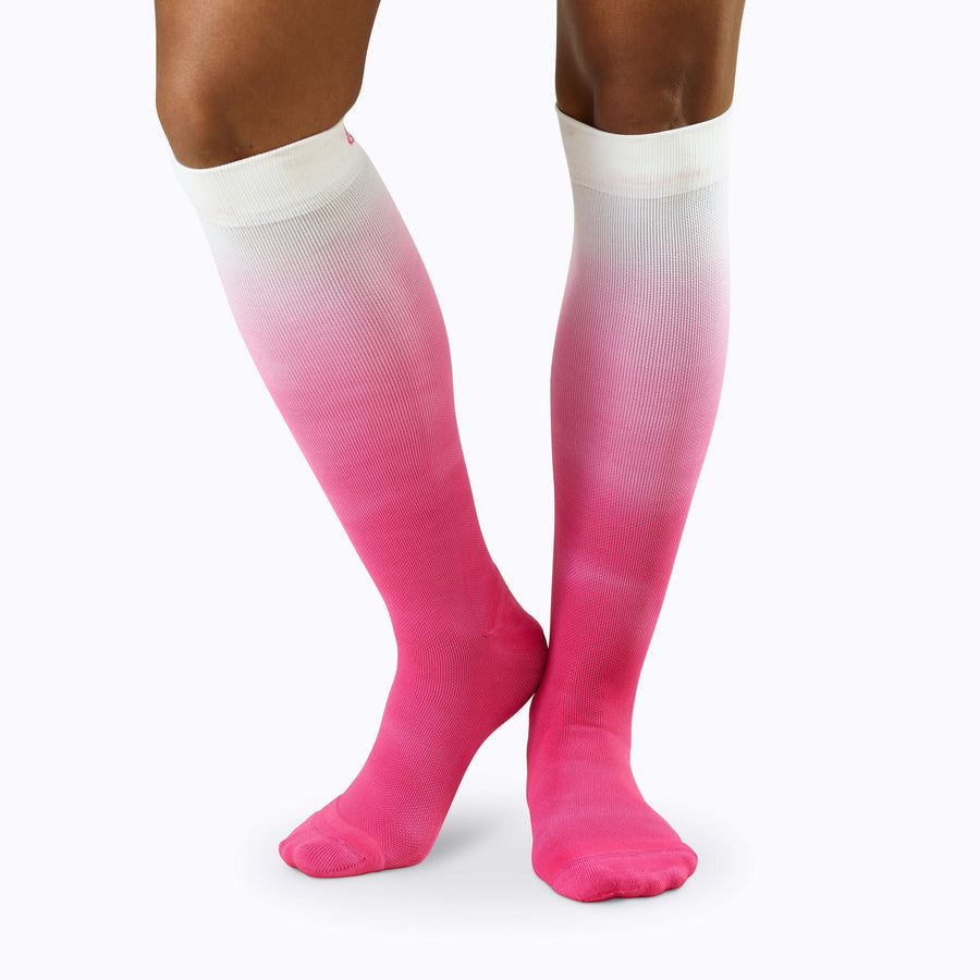 Front view of legs wearing  Knee-High Compression Socks in berry ombre