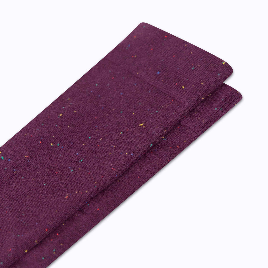 Close up view of  recycled cotton socks in botanical-potent-rose confetti