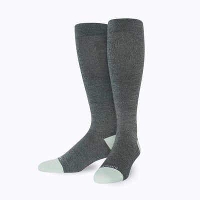 Front view of knee high compression socks in black-blue-sage