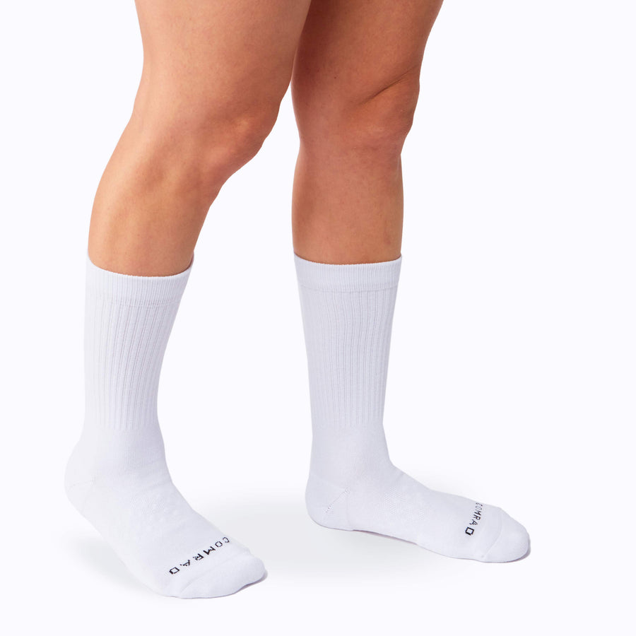 Side view of legs wearing the combed cotton crew in white solid