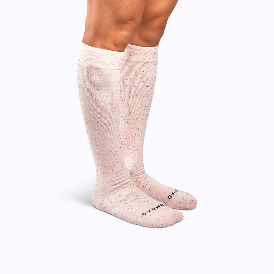 Side view  of feet of recycled cotton socks in rose solid