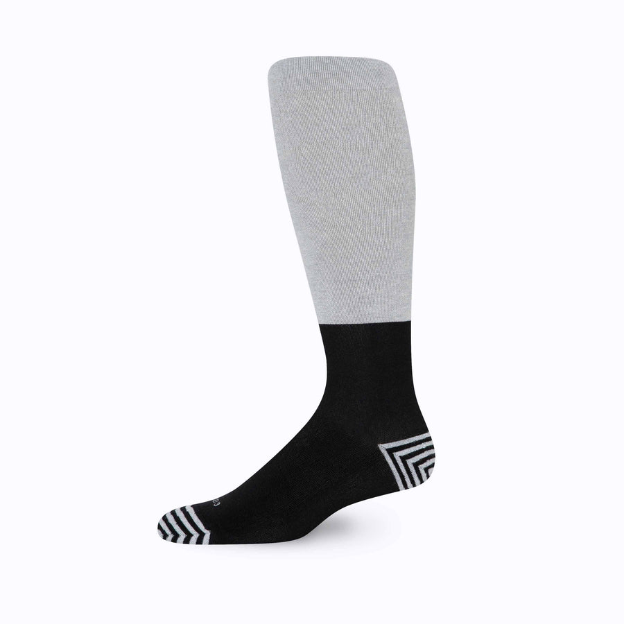 Side view of knee high cotton compression socks in grey-black tencel colorblock 