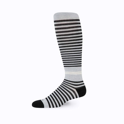 Side view of knee high cotton compression socks in grey-black tencel stripe