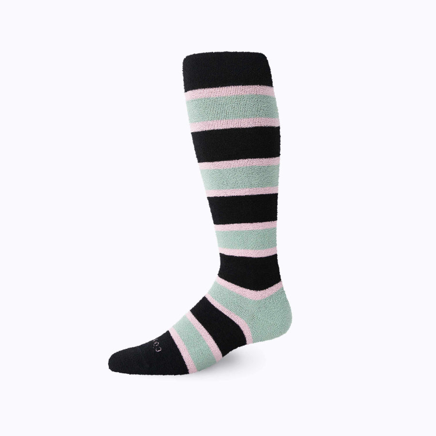 Side view of cozy nylon compression socks in black-green
