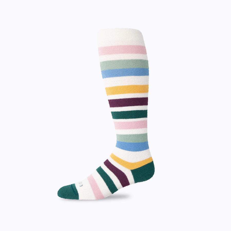 Side view of cozy nylon compression socks in sand-multi