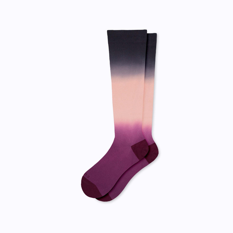 A pair of  knee high nylon socks in rose-potent-black ombre