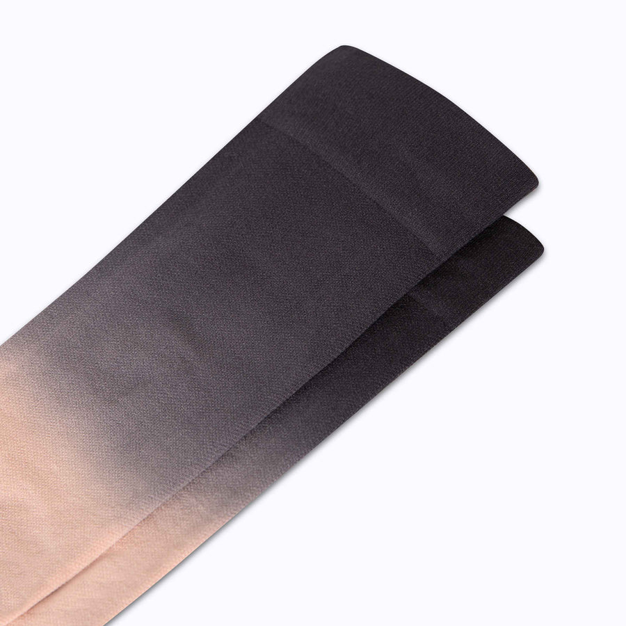 Close up view of  knee high nylon socks in rose-potent-black double dip ombre
