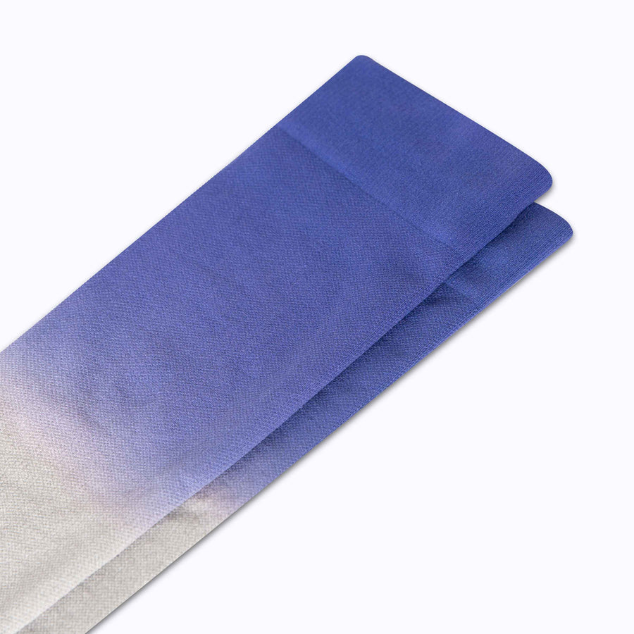 Close up view of  knee high nylon socks in grey-aster-royal double dip ombre