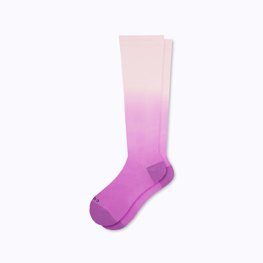 A pair of knee high nylon socks in lavender-mulberry ombre 