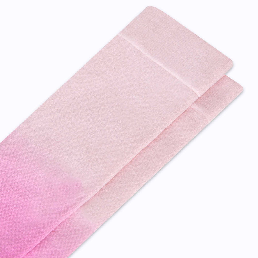 Close up view of knee high nylon socks in lavender-mulberry ombre 