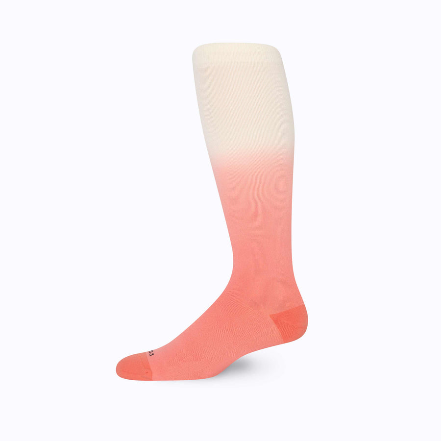 Side view of knee high nylon socks in cream-terracotta ombre 