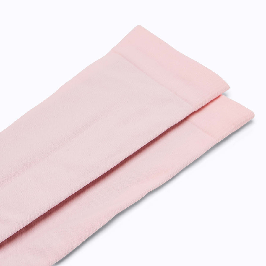 Close up view of nylon knee high socks compression in rose solid