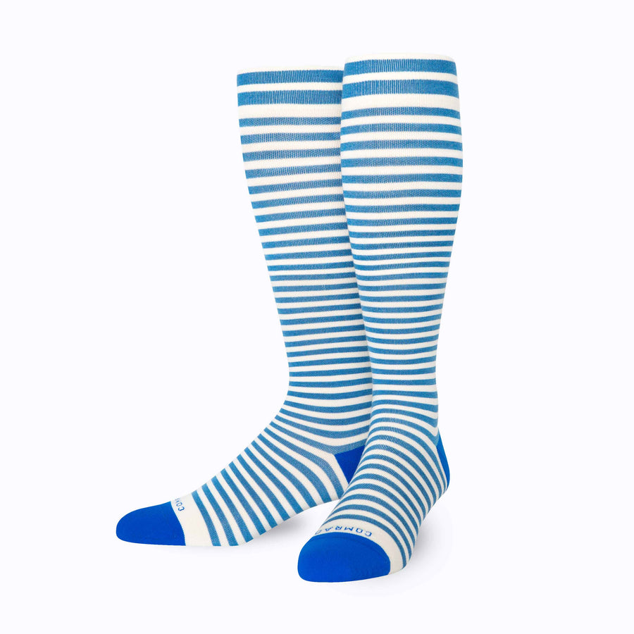 Front view of merino knee high compression socks in blue-sand tencel stripes